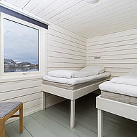 Schlafzimmer 4 in der Rorbu-Wohnung Kokkbua mit 2 Einzelbetten.