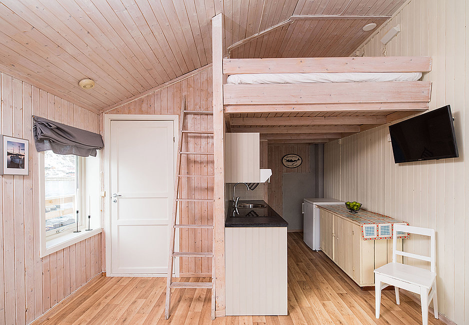Die kleine Wohnung Linbua mit Küchenbereich und Schlafhems.
