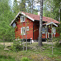 Außenansicht des Timmerhuset oberhalb der Sundviks Farm am Stor-Lungen.