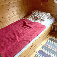 Blick ins zweite Schlafzimmer mit ebenfalls 2 Einzelbetten.
