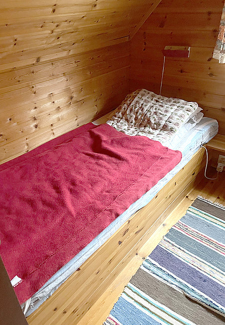 Blick ins zweite Schlafzimmer mit ebenfalls 2 Einzelbetten.