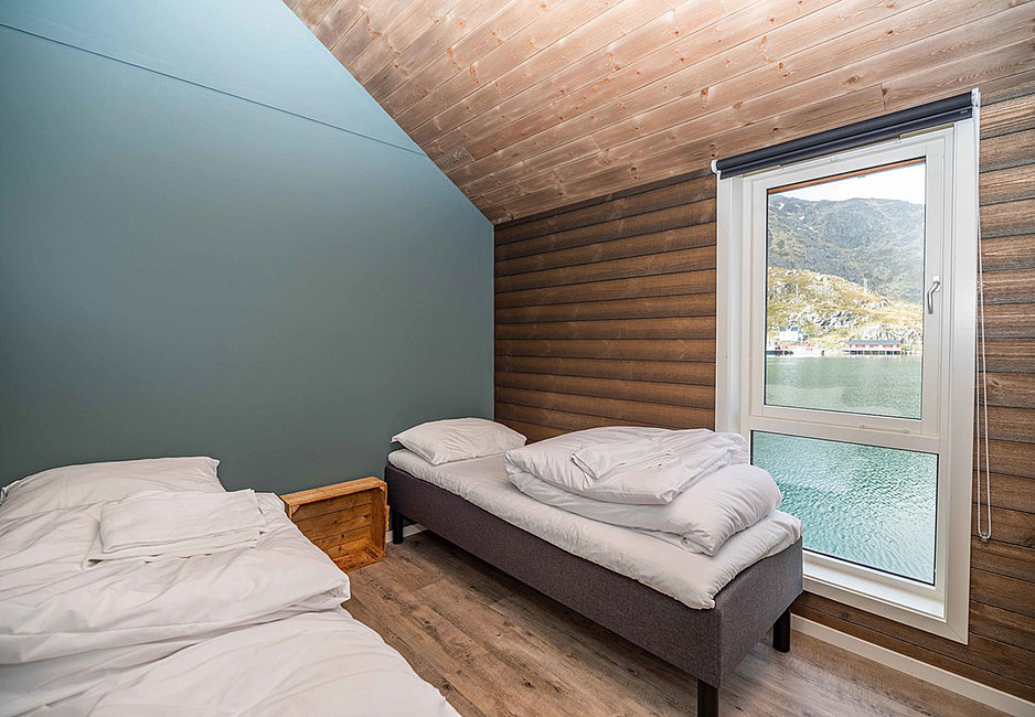 Schlafzimmer mit 2 Einzelbetten in der modernen Wohnung Lottebua.