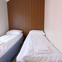 Auch das dritte Schlafzimmer besitzt 2 Einzelbetten.