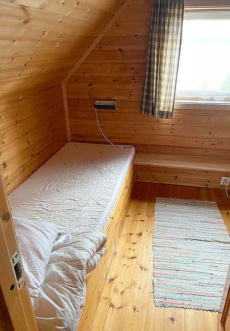 Haus 2 besitzt 2 Schlafzimmer mit je 2 Einzelbetten.